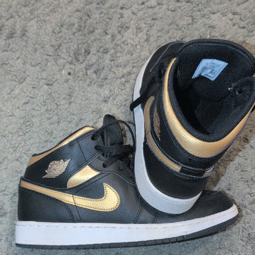 Air Jordan Mild 1 Nike Black and Gold Mid-Top Sneakers